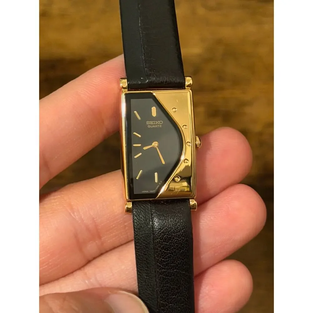 Seiko Rivoli Quartz SXN434J Gold Tone Black Dial Rectangular Watch Leather Strap